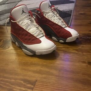 They are red and grey Jordan 13 size 10